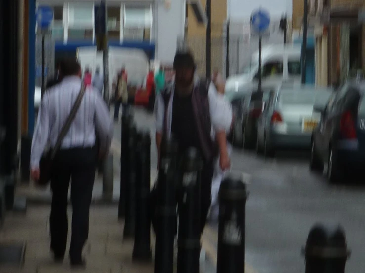 blurry image of pedestrians on a city street