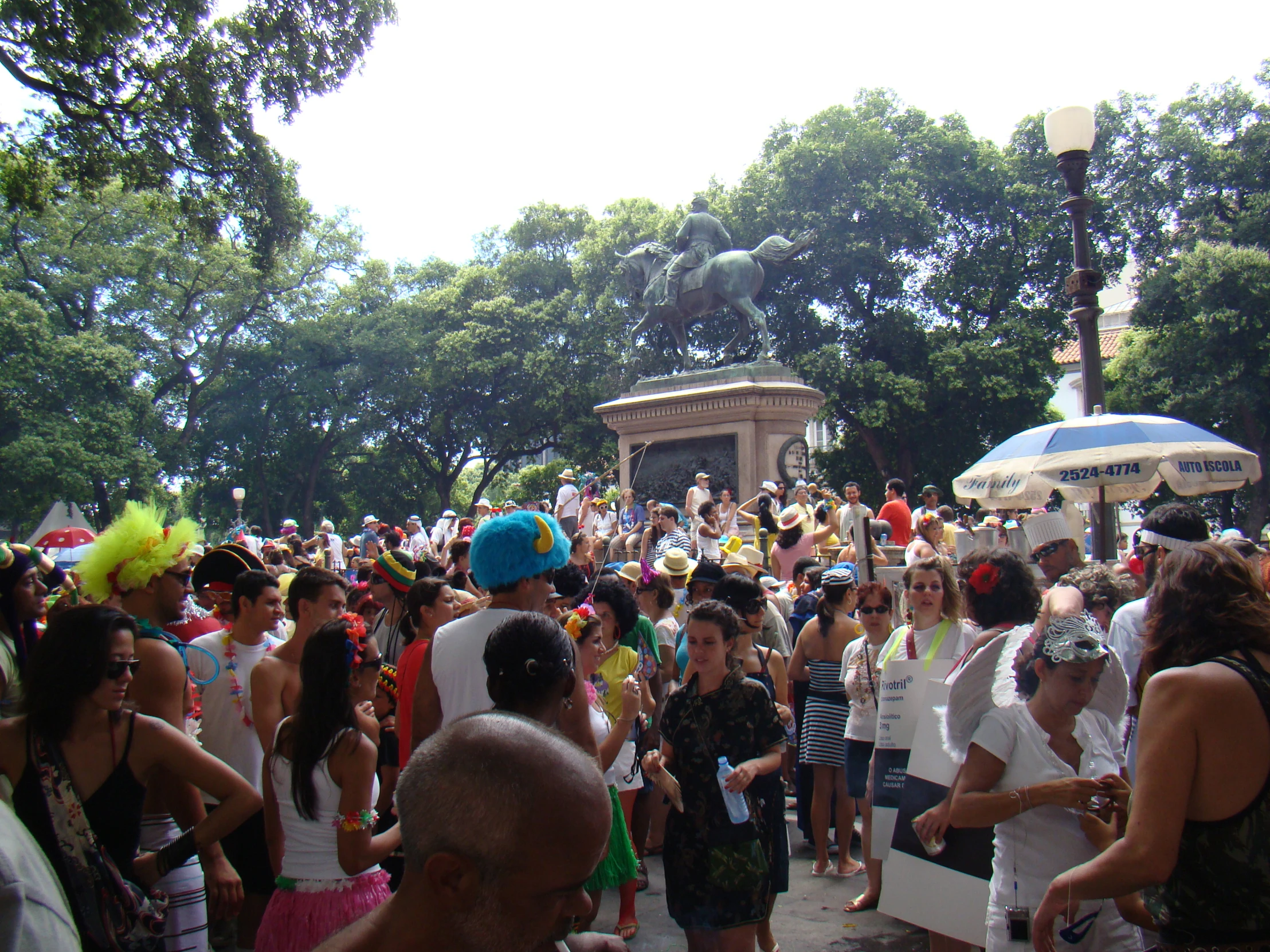 a group of people standing around each other