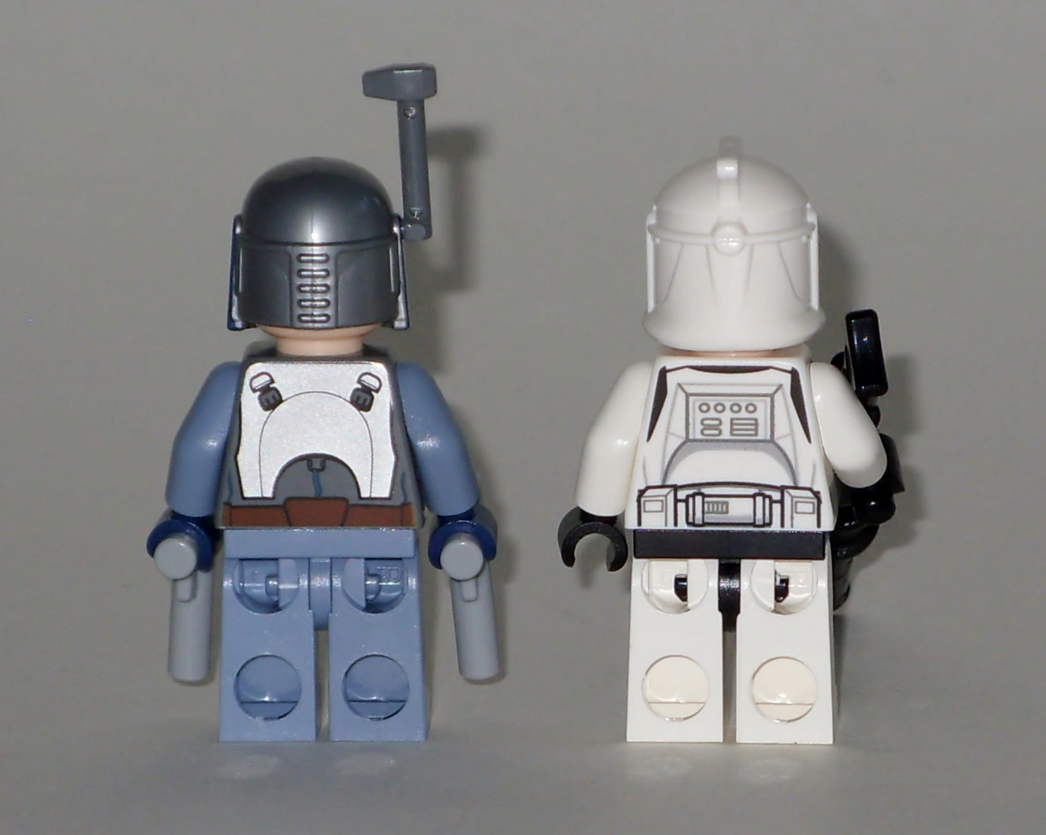 a lego star wars figure next to a lego storm trooper figure