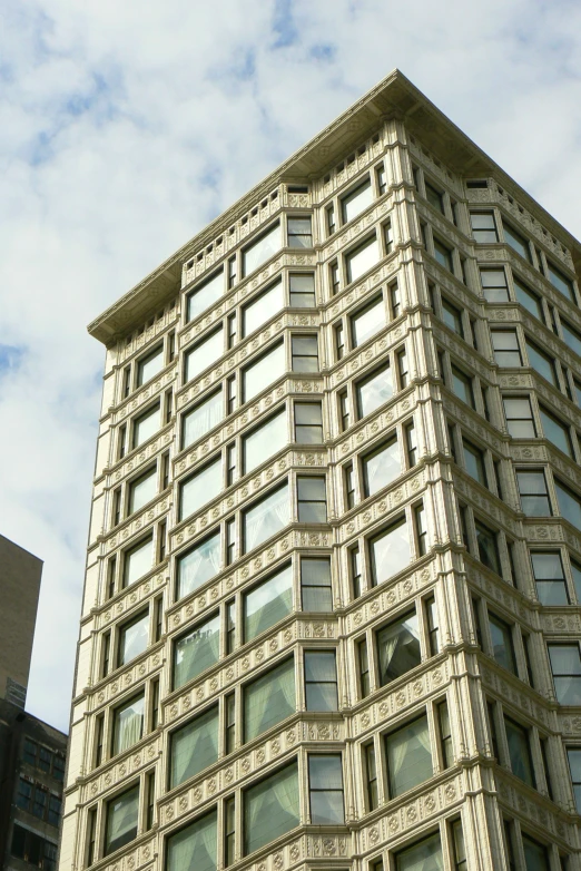 a tall building with lots of windows is shown