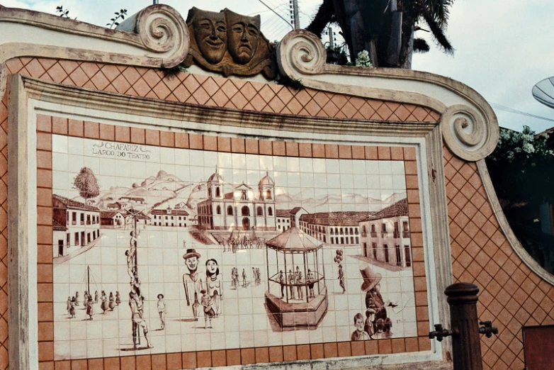 wall with painting and carving of old european country town