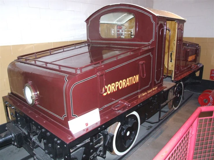 a small train sitting on display in a room