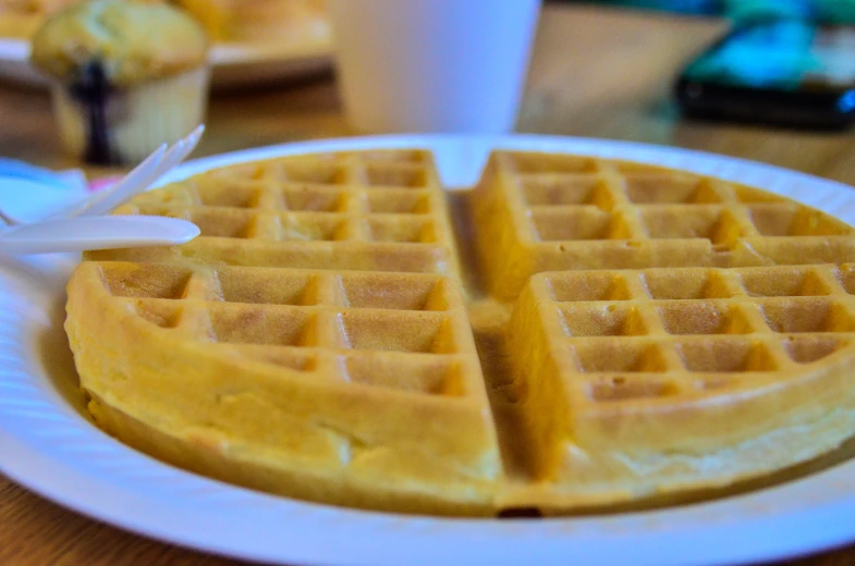 a large waffle with one slice taken out of it