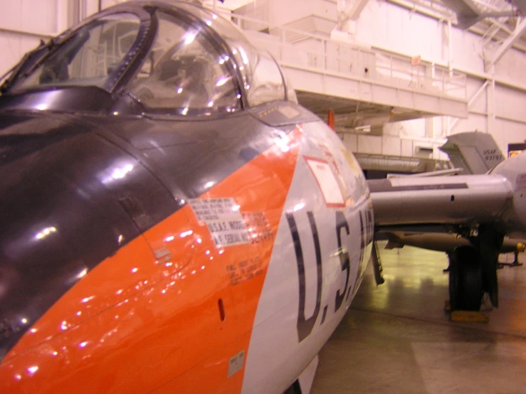 the nose of an airplane in an air museum