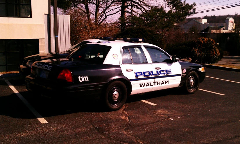 an image of a police car parked at a garage