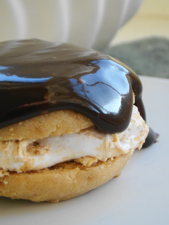 a pastry with chocolate and cream on top