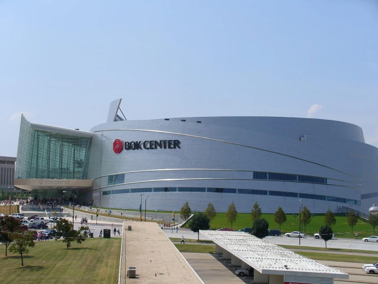 the large building has a glass window on the top