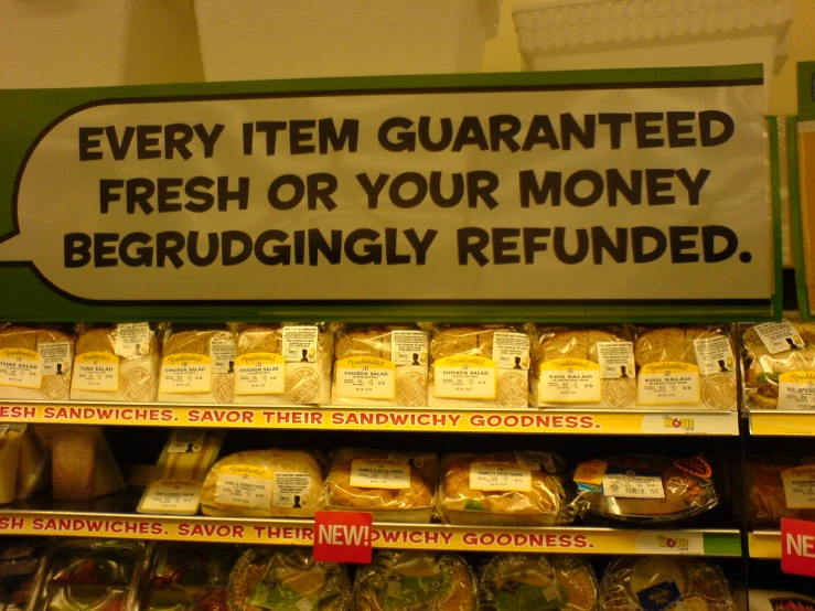 a food shelf with bags of bread and bread