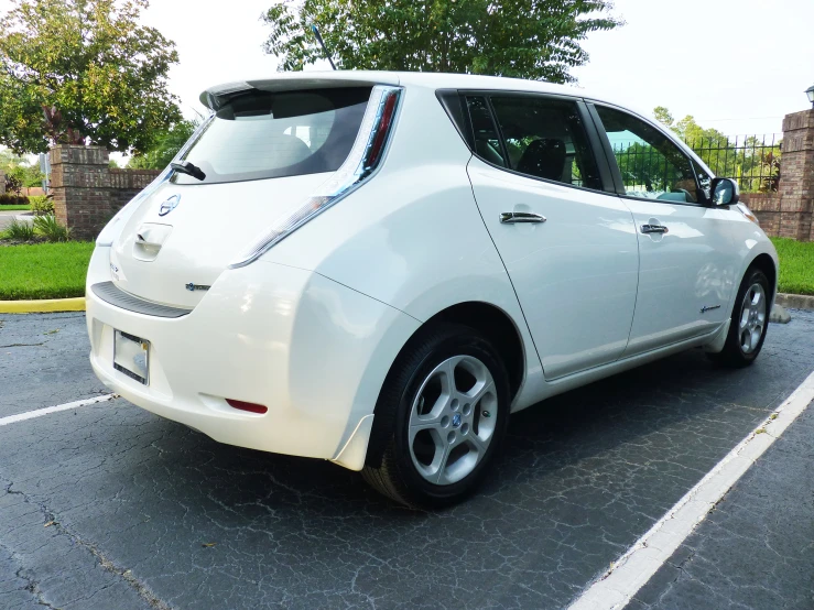 an electric car parked in a parking lot