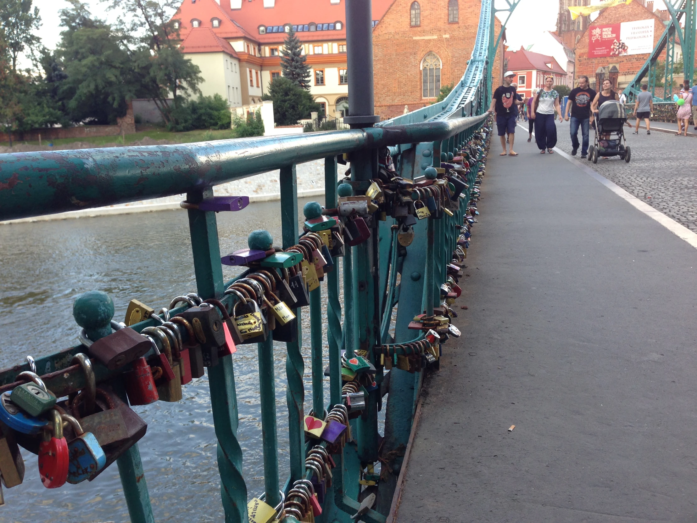 there are many locks attached to the bridge