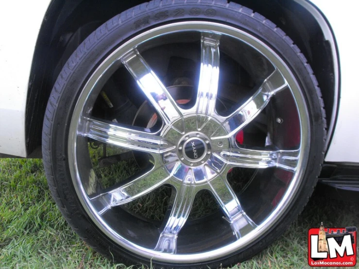 a tire on a vehicle on grass and dirt