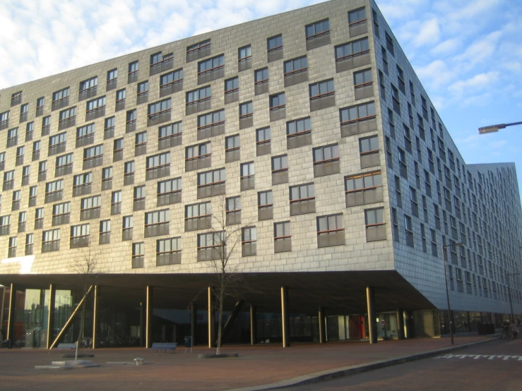 the modern looking building has many windows