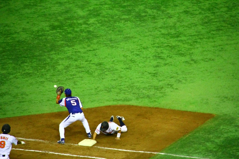 baseball player preparing to bat while catcher and umpire watch