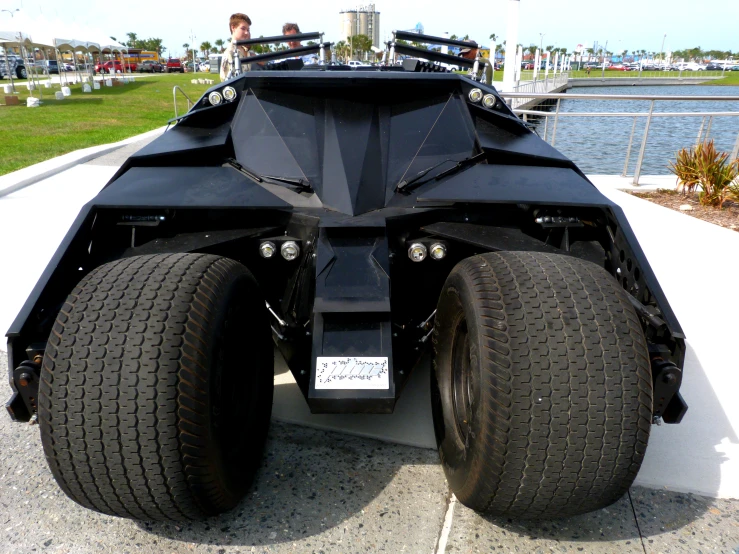 a batman car replica is displayed at the tokyo international expo