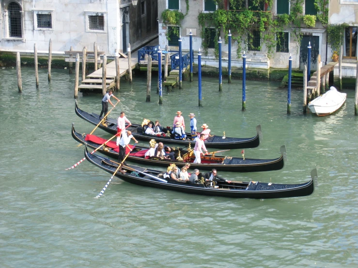 there are people on a row boat ride