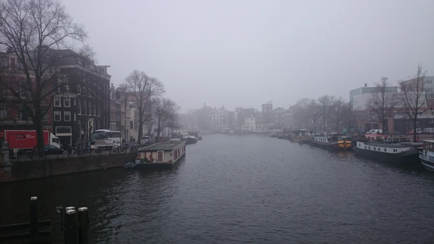 a canal runs through buildings on both sides