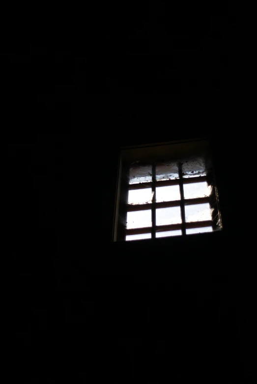 light through a window lite up in the dark