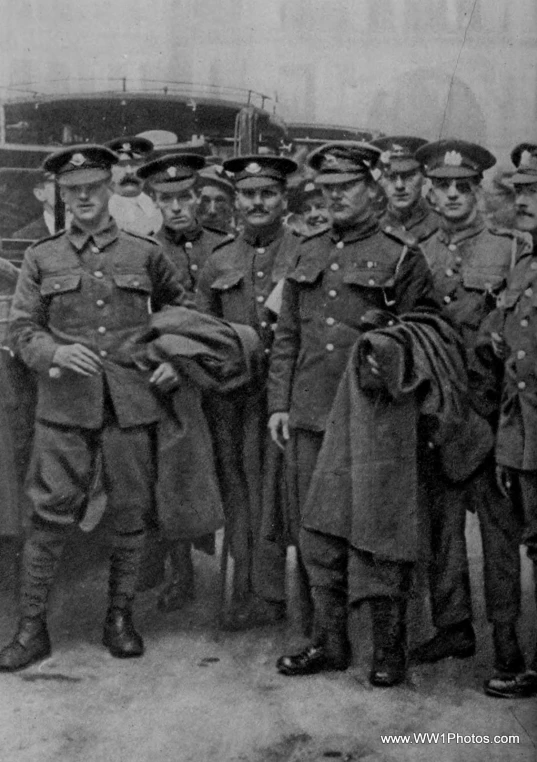 a group of men in uniforms posing together