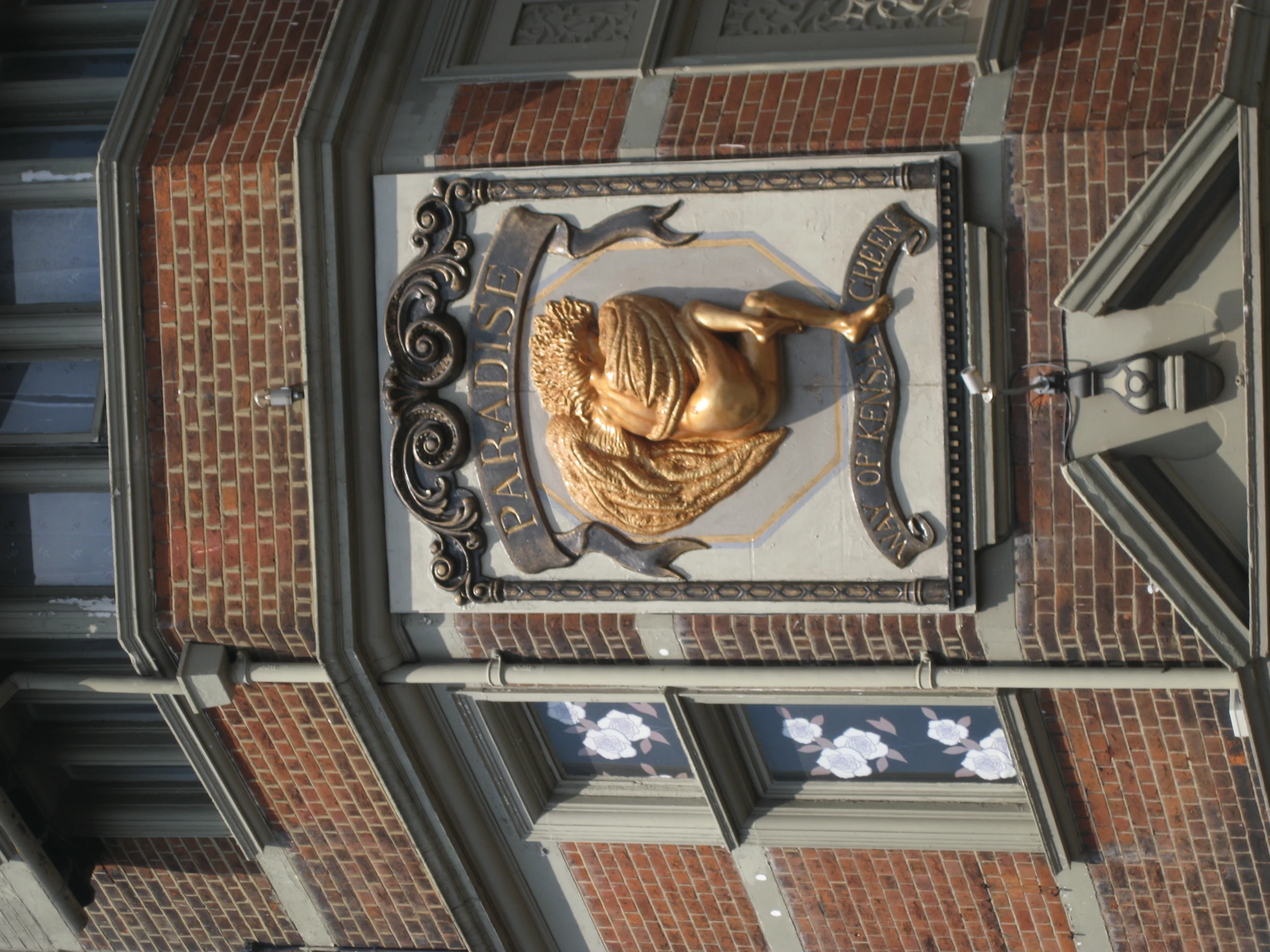 the facade of the building has a large sign on it