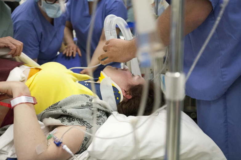 an image of a person lying in hospital bed