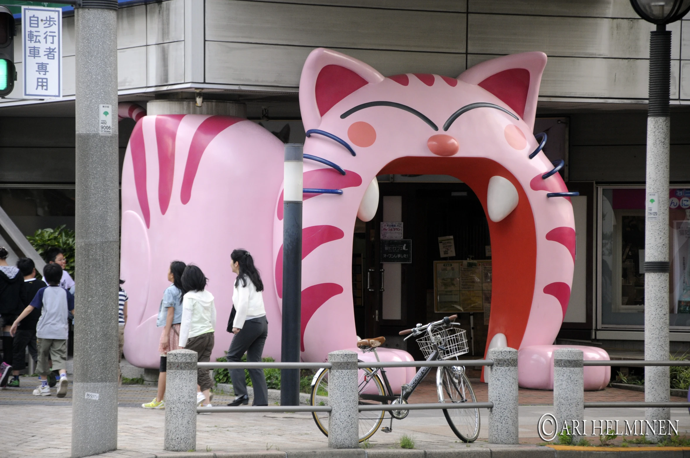 a giant pink cat inflatable building with a cat's head