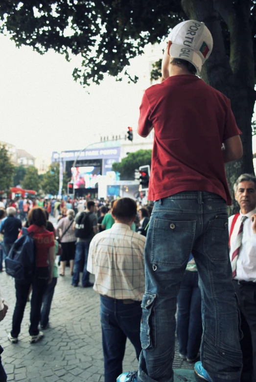 people standing in front of a large crowd