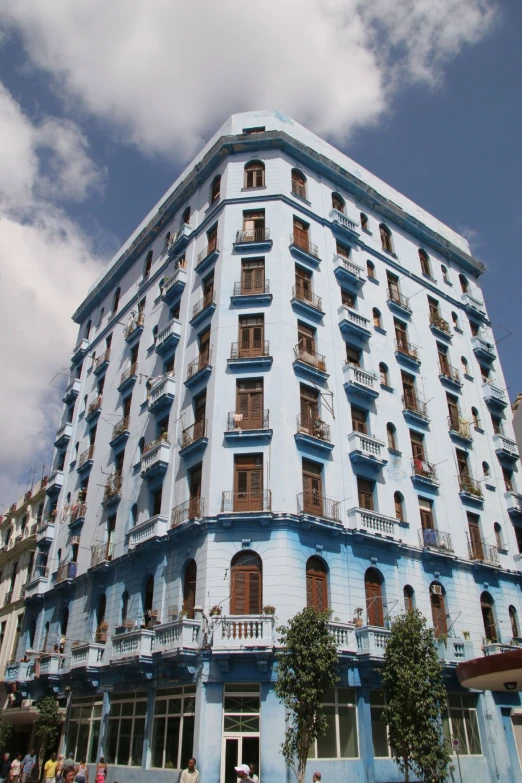 the blue building has windows on each side