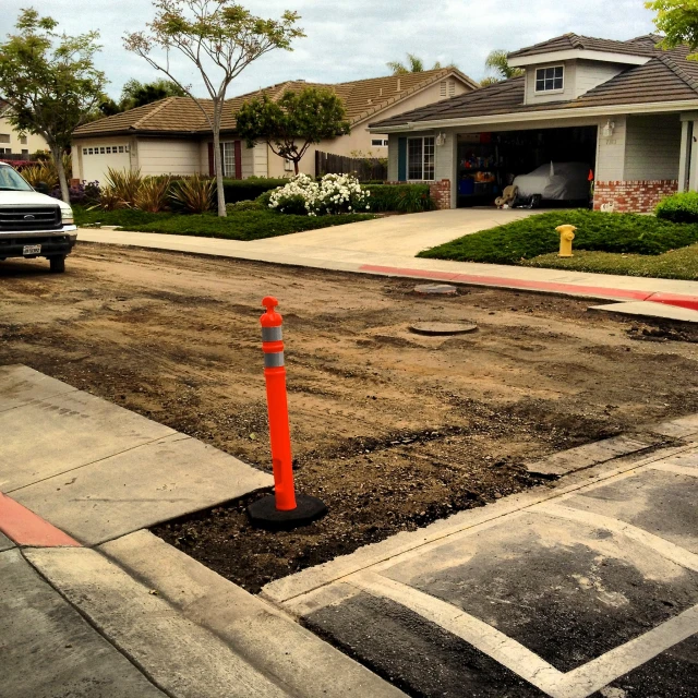 an empty street is being built at a neighborhood