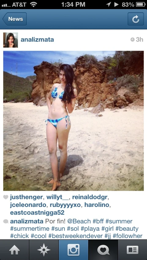 a woman in a bikini on the beach