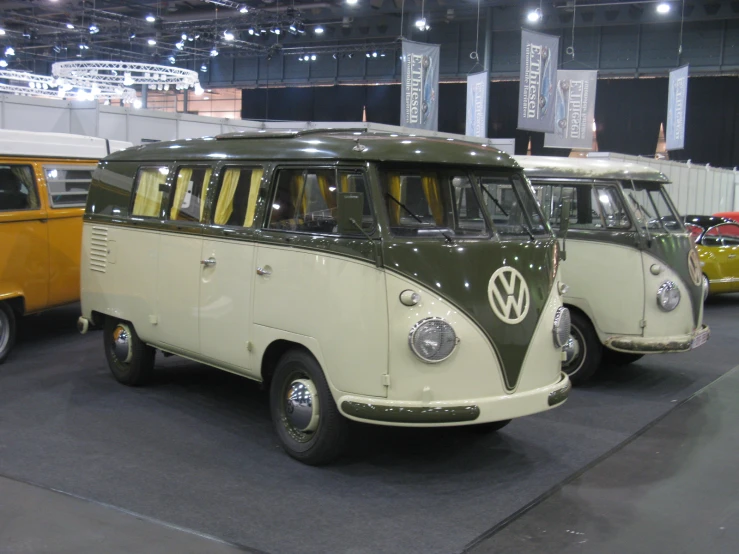 an older version of the vw bus is on display at a show