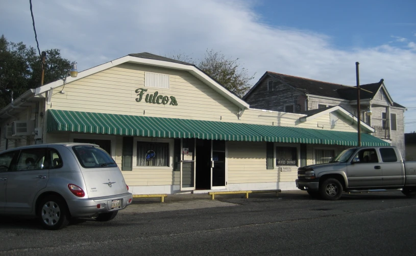 a picture of a small store sitting outside of a building