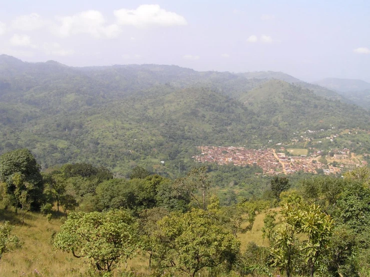 the green mountains are visible with the town nestled on one side