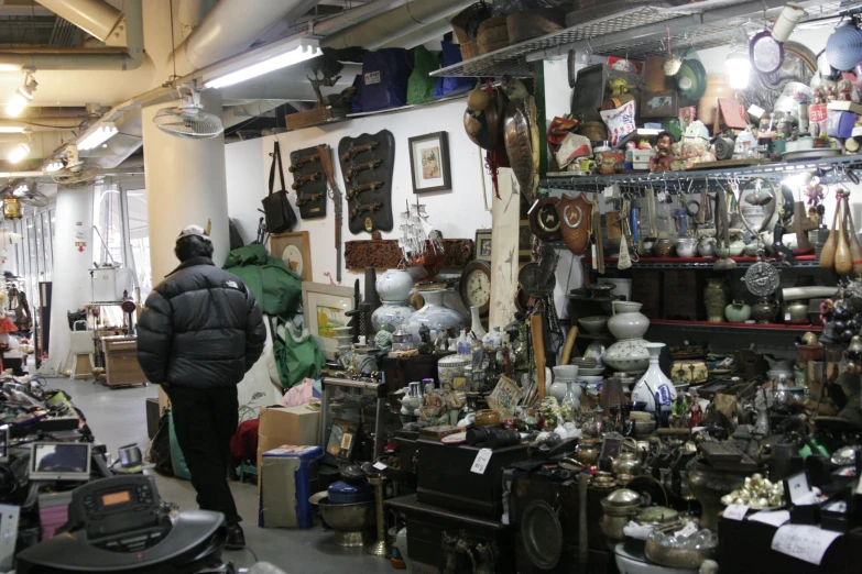 the interior of a shop with many items and shelves