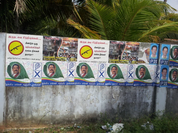 a wall full of political posters of different countries