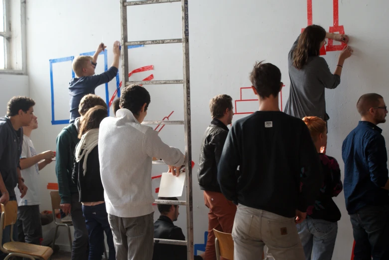 a group of people standing in a room