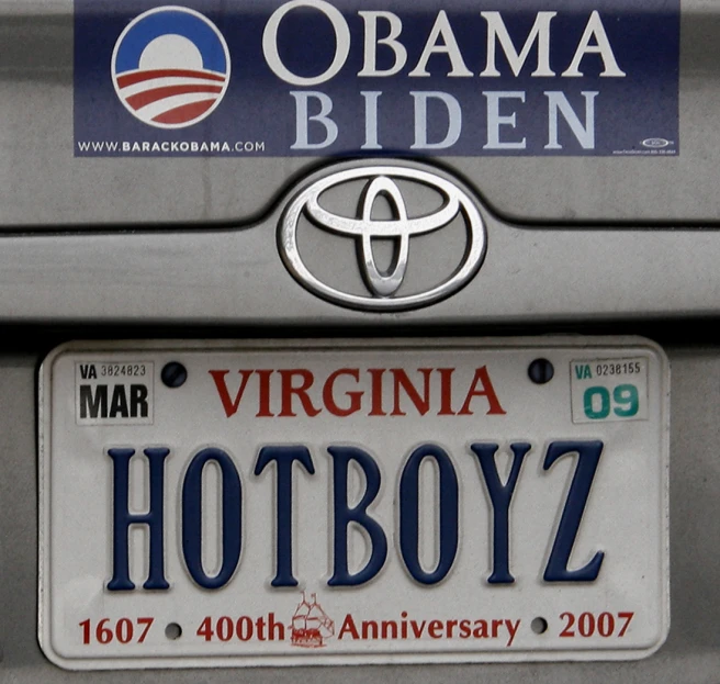 obama biden and a license plate in the shape of a toyota sign