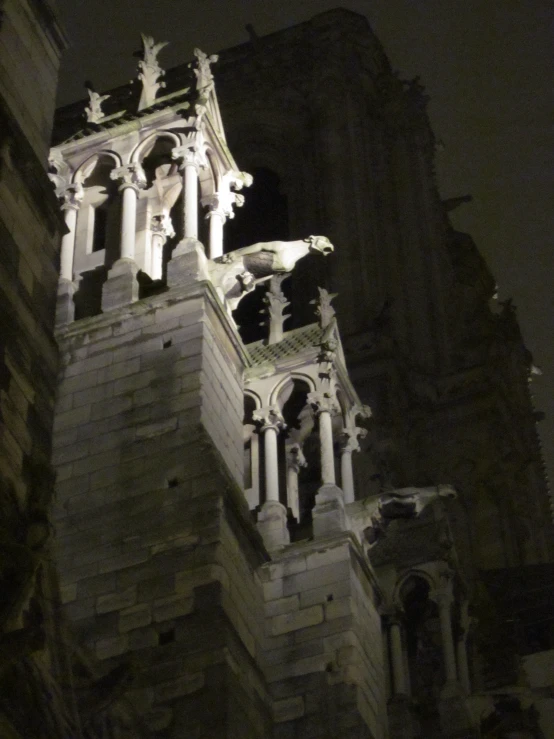 a clock is mounted on a stone tower