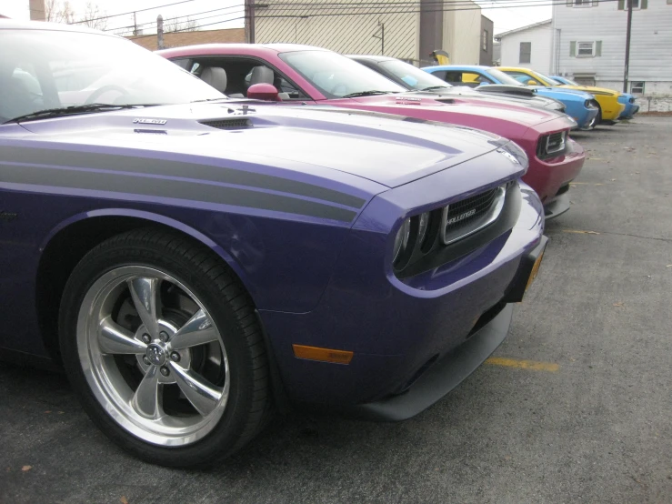 a dodge car parked in a parking lot