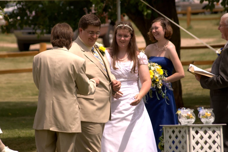 the young couple are getting married at a ceremony