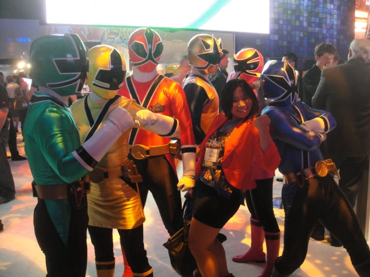a group of people wearing different types of suits and gear