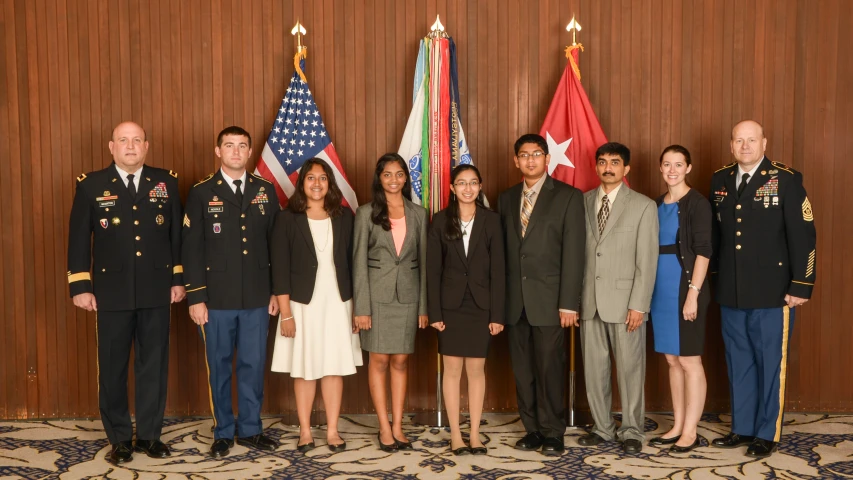 a group of uniformed men standing next to each other