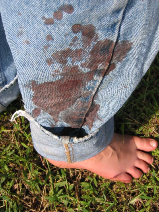 the jeans are wet and the dirt looks like they have gotten a lot of brown paint