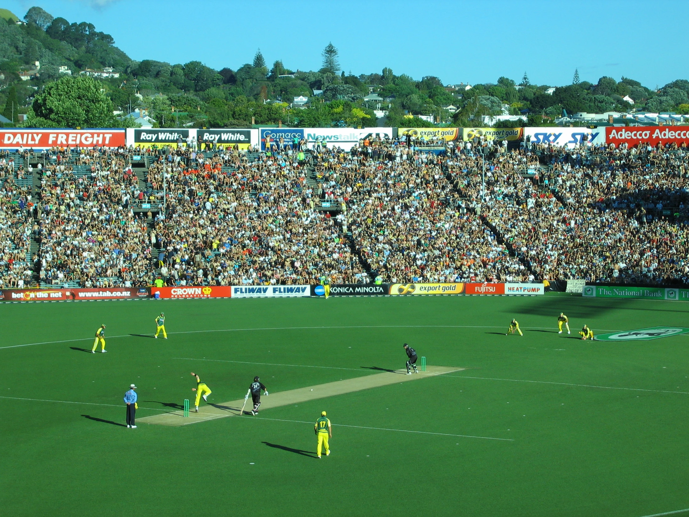 a soccer field with people on it during a game