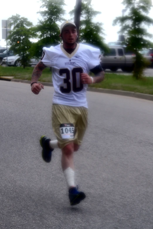 a football player is running on a race