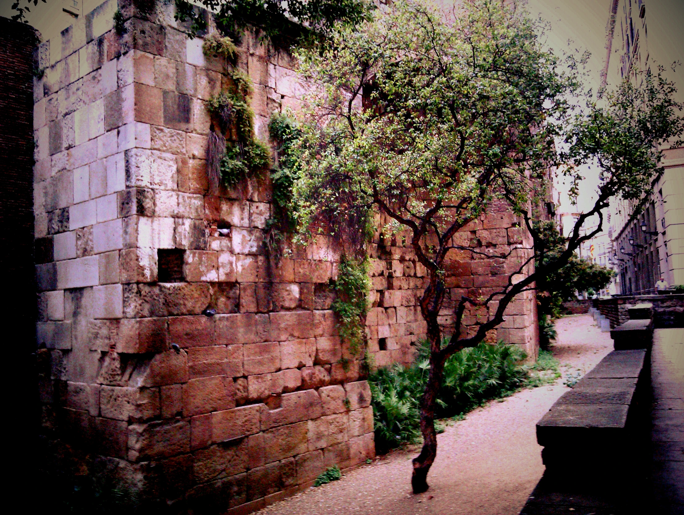 an image of some brick buildings that are very old