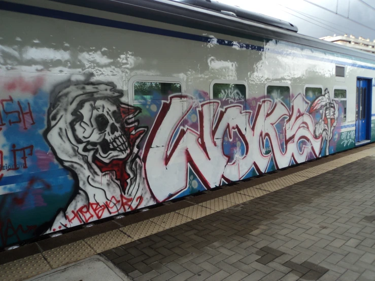 the train car has graffiti on it