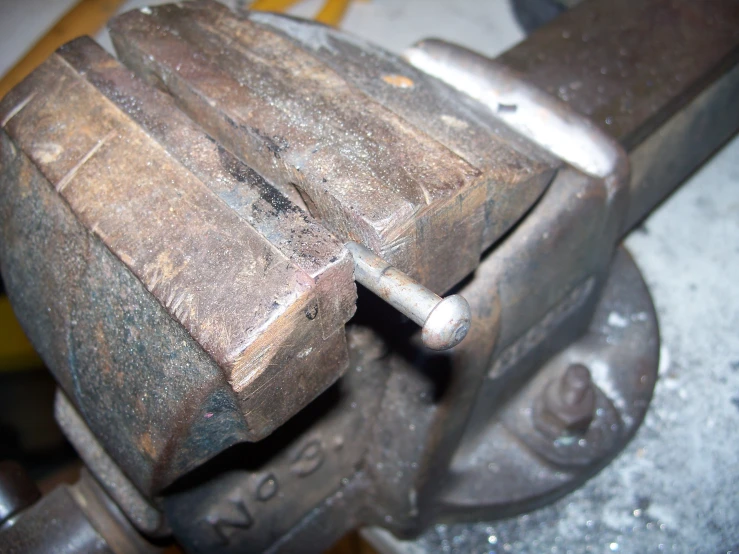 close up view of an old style bench vice