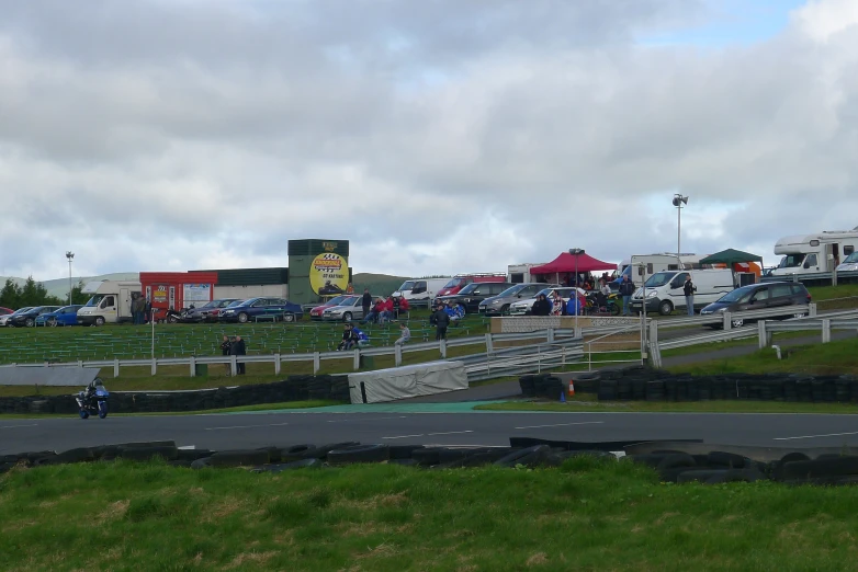 a group of people on motorbikes are gathered together