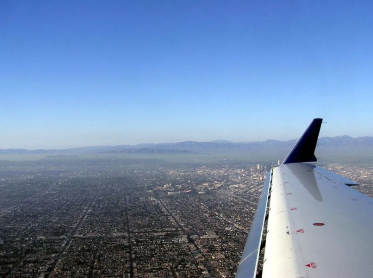 a wing is seen flying over the city