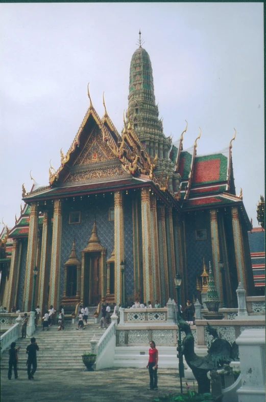 a very ornate building that has a big roof